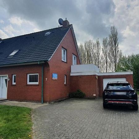 Ferienhaus Am Wellenpark Norddeich Esterno foto