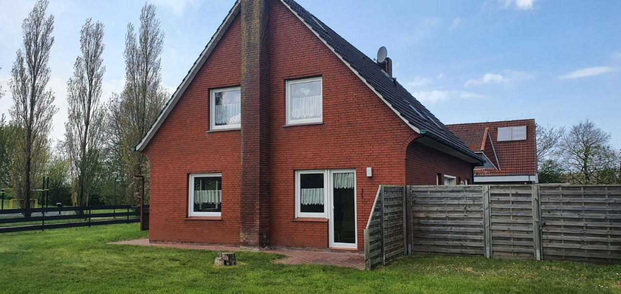 Ferienhaus Am Wellenpark Norddeich Esterno foto